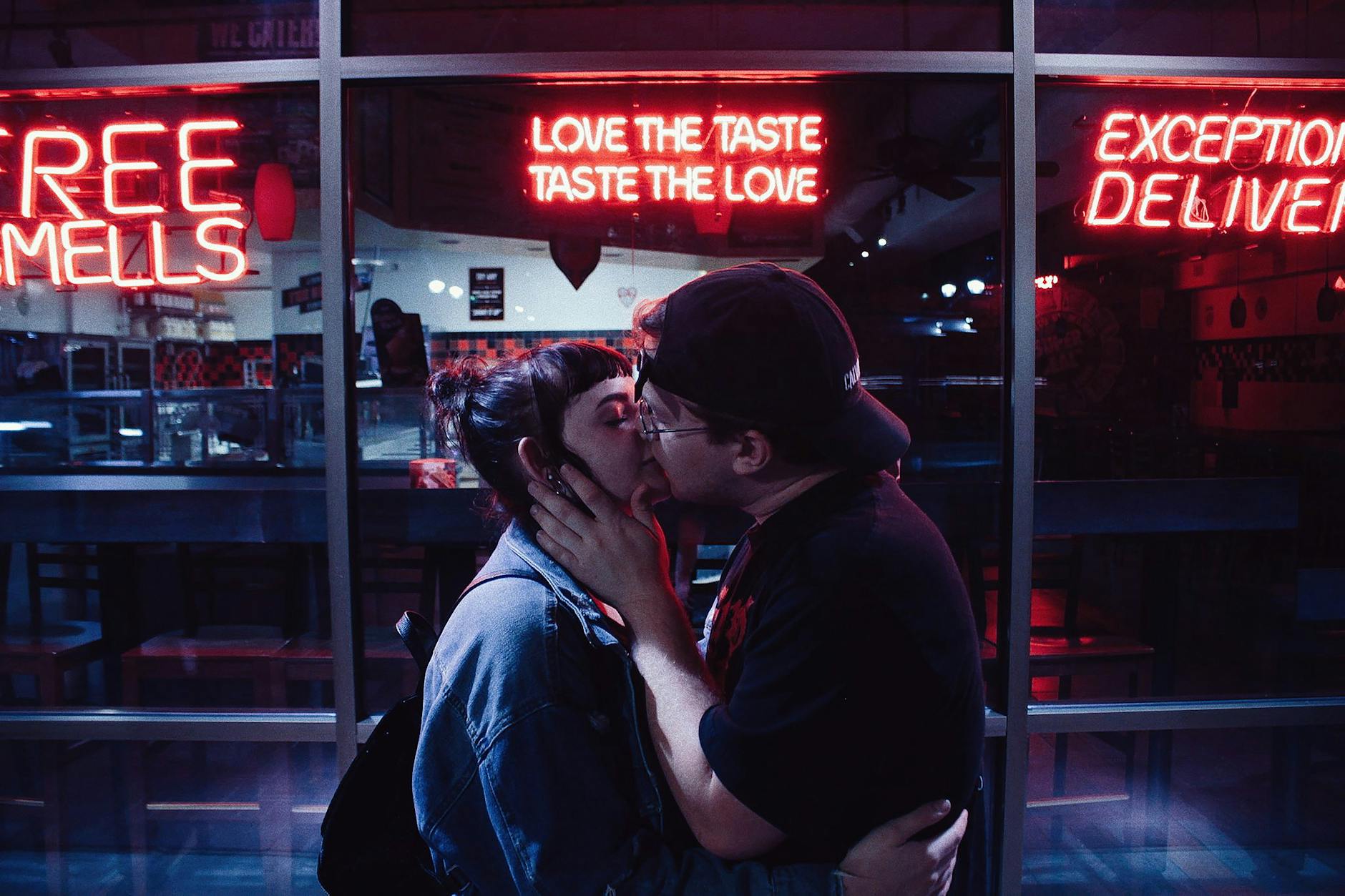 man and woman kissing