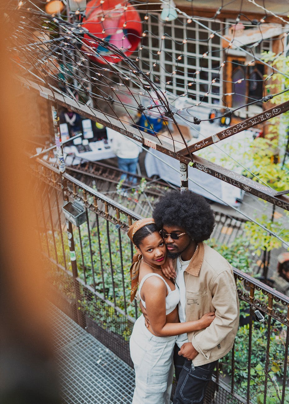young couple standing together and hugging