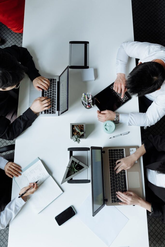 overhead shot of a group of people having a meeting