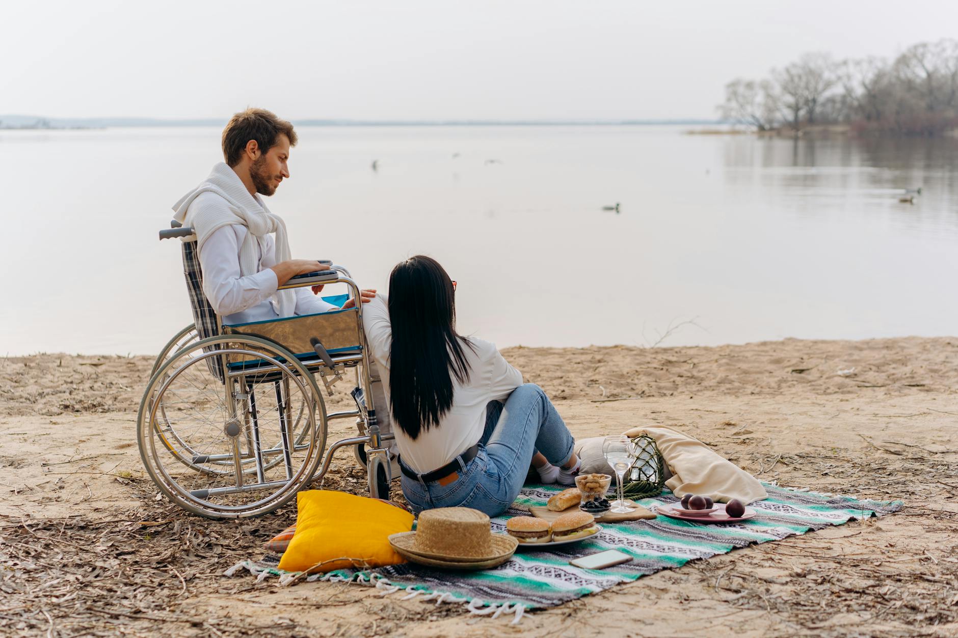 man and woman near the lake