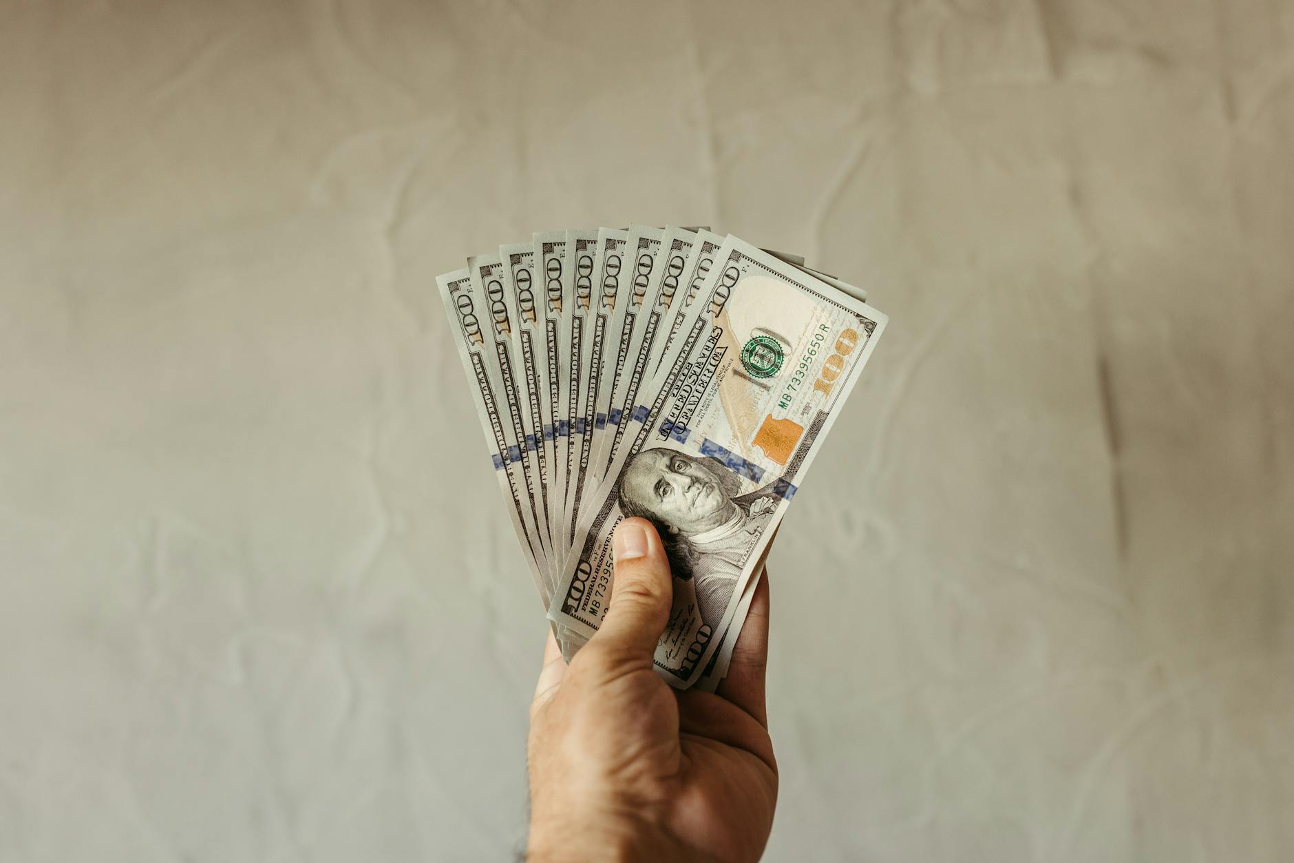 hand holding cash