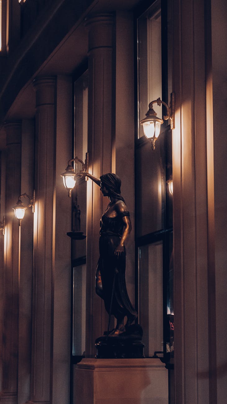 themis sculpture in a court
