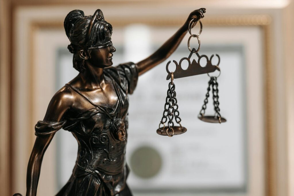 themis figurine at lawyers office